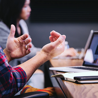Professionals collaborate and make deals at Austria Business Center, Dubai, a hub for business growth.